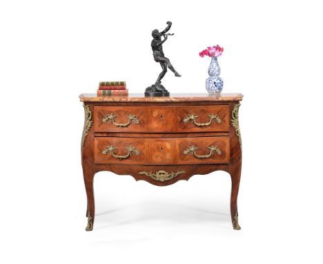 ϒA French rosewood and tulipwood serpentine commode, in louis XVI style, second half 19th century, the shaped marble top abov