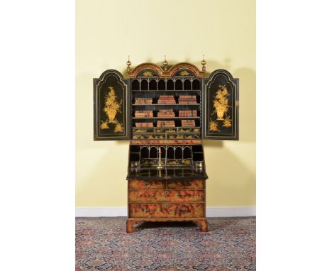 A simulated tortoiseshell and gilt japanned bureau bookcase, circa 1720, decorated throughout with figures in traditional vil