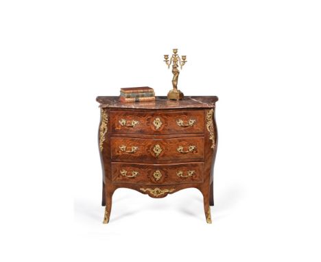 ϒA rosewood, marquetry and gilt metal mounted serpentine commode, in Louis XVI style, second half 19th century, the mottled r