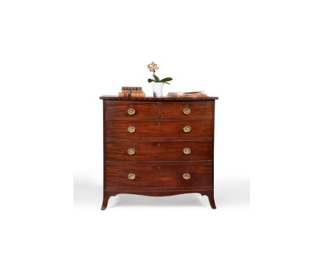 A George III mahogany bowfront chest of drawers, circa 1800, the top above two short and three long graduated drawers, on out
