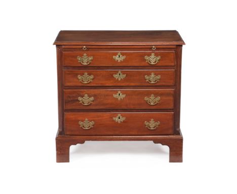 A George III mahogany chest of drawers, circa 1780, the rectangular top with a moulded edge, above a slide and four long grad