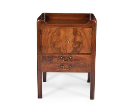 A George III mahogany tray top bedside commode, circa 1780, the rectangular top with solid three quarter gallery incorporatin