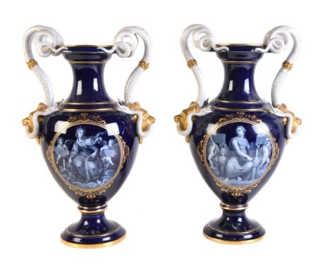 A pair of Meissen blue-ground and gilt vases, late 19th century, decorated in the Renaissance Limoges enamel style with class