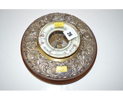 An Edwardian silver mounted wooden barometer, by J. H. W. Birmingham, 1903, 7 1/2in. wide.