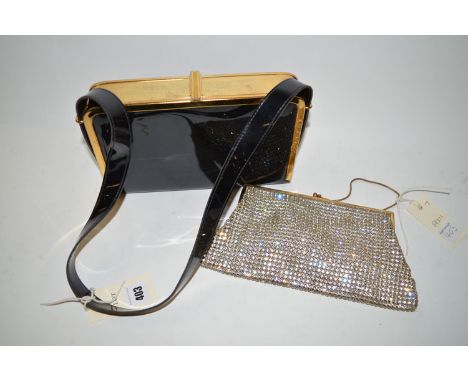 A lady's black patent leather handbag, with gold coloured metal trim; together with a lady's clutch bag decorated with glass 