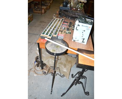 Four Universal tool racks, by Burgon & Ball; together with two metal plant stands.