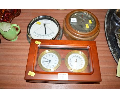 A Chips inclinometer, inscribed 'Observator Rotterdam'; a aneroid barometer in circular wooden mount, by Wilson, Ward & Co. L