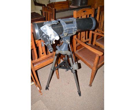 A Jessops Astronomical telescope and tripod.