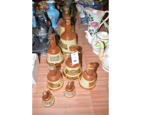 A collection of Wade Bells Scotch Whiskey, bottles and various sizes (four with contents).