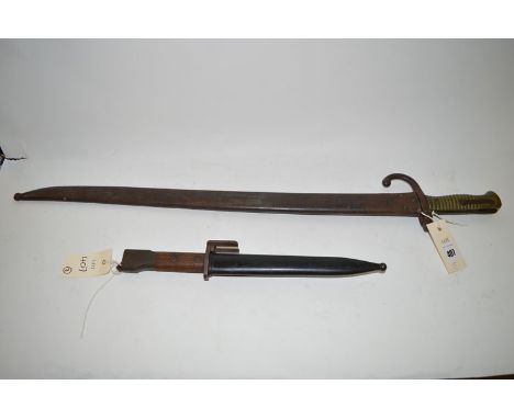 Small to mid/late 20th Century double sided bayonet, with wooden handle and battle sheath; together with a French 1870 patter