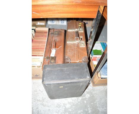 Two vintage suitcases; together with a leather tea set box (empty). (3)