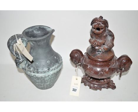 A Chinese carved soap stone bowl and cover, with elephant mask handles and dog of foo finial; together with a Studio pottery 