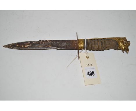 An Italian dagger with a single sided pointed blade in ornate metal handle, with wooden wire band grip (no sheath or scabbard