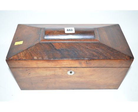 A 19th Century rosewood sarcophagus shaped tea caddy, the hinge cover opening to reveal lidded compartments and a space for a