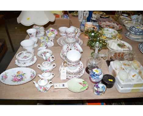 Decorative china: an Aynsley table lamp, bowl and cover; Royal Doulton flower ornaments; a part tea set with floral decoratio