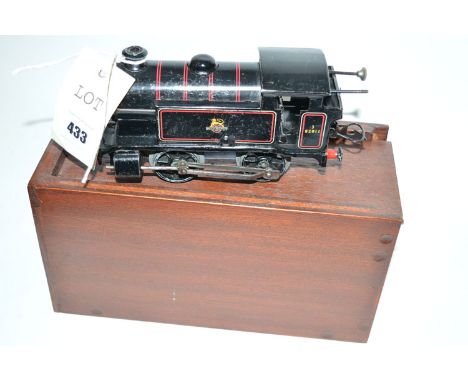 A Hornby model tanker engine, with black and red British Rail livery, in a lime stained wood case.