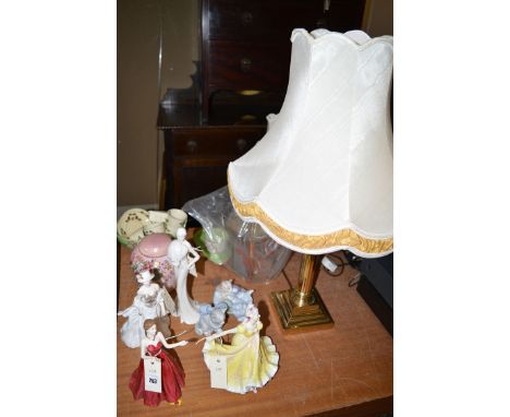 Two Royal Doulton figurines; a Royal Worcester figurine; two Nao cats; together with another figure; Maling ware; table lamps