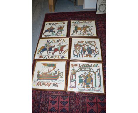 A series of framed woolwork panels depicting scenes from the Bayeux tapestry, signed D.M.C. and dated 1975.  (6)