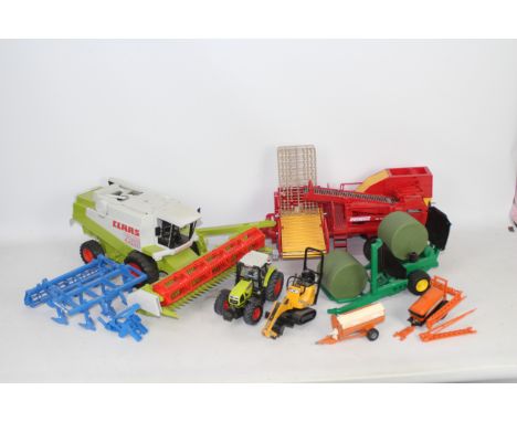 Britains, Bruder, Other - An unboxed herd of diecast and plastic agricultural vehicles and implements in various scales. Lot 