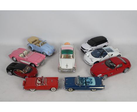 Danbury Mint, Maisto, Others  - Nine diecast and plastic model cars in various scales. Lot includes Danbury Mint 1:24 1956 Fo