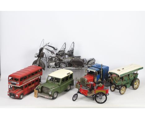 Six decorative tinplate / pressed metal model depicting a variety of vehicles in various scales, including a Land Rover, Amer