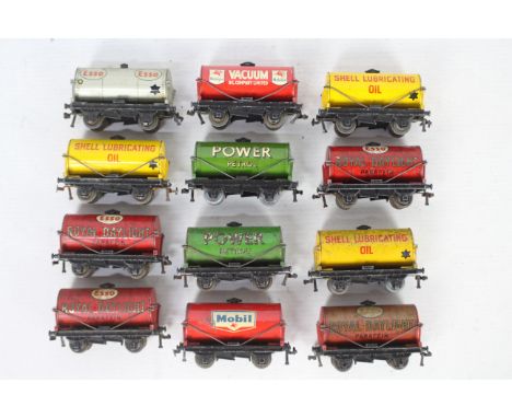 Hornby Dublo - A rake of 12 unboxed Hornby Dublo OO gauge tanker wagons. Lot includes Hornby Dublo #32080 'Power Petrol'; #32