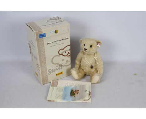 Steiff Teddy Bear - A boxed Steiff Blonde Mohair bear with friendship bracelet 'Anna The Friendship Bear' #661952 Bear measur