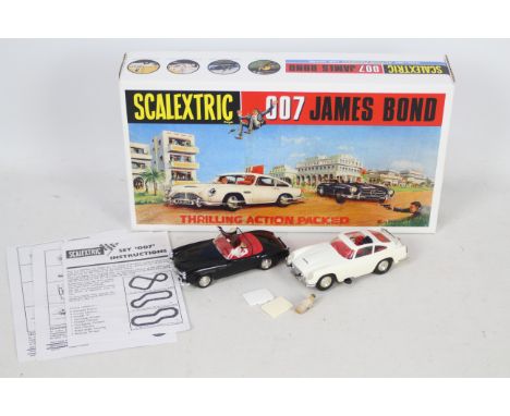 Scalextric - A boxed set containing two rare vintage Scalextric 'James Bond 007' slot cars. The set contains a 1967 / 68 '007