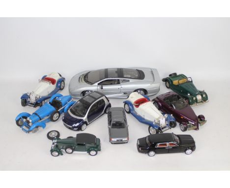 Maisto, Bburago, Kyosho, Polistil, Other - An unboxed group of ldiecast model vehicles in various scales. Lot includes Maisto