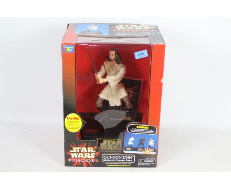 Star Wars - Episode 1 - Qui-Gon Jinn - Interactive Talking Bank with combat actions and original voice. Item appears in boxed