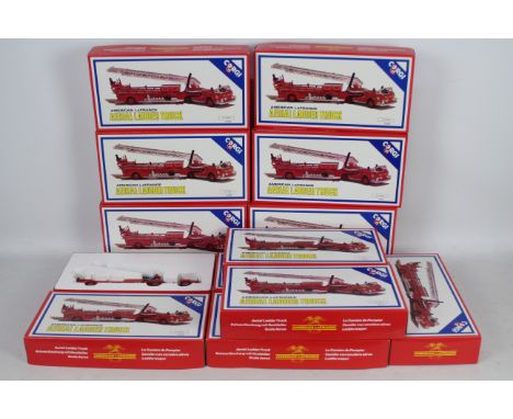 Corgi - A trade box of 12 x American La France Aerial Ladder Fire Trucks # 97320. This is unsold shop stock which has been is