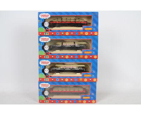 Hornby - Four boxed Hornby OO gauge 'Thomas the Tank Engine &amp; Friends' items of 'Circus' Flatbed wagons. Lot consists of 