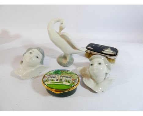 Lladro goose figurine, two Lladro cherubs, an enamel trinket box with Danbury vineyard and a small brush with silver and moth