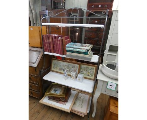 A tubular metal white painted shelf unit 