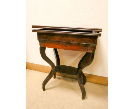 A mahogany folding top card table fitted drawer with a shelf under on four shaped legs 22" wide 