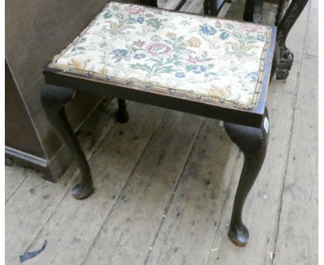 A dressing stool with tapestry seat standing on cabriole legs 