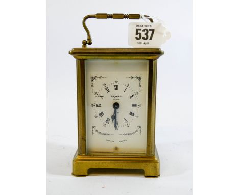 A French brass eight day carriage clock approx 11cms tall 