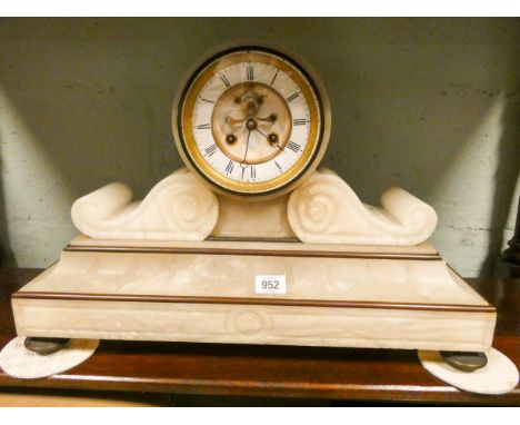 A French striking mantel clock in a white alabaster case 13 1/2" high, 20" wide 
