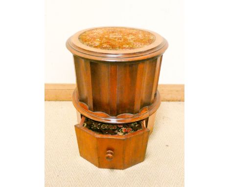 A circular Victorian mahogany commode with liner and pull out step 