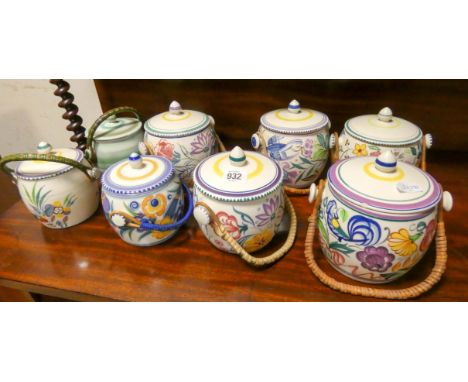 Eight various Poole Pottery biscuit barrels 