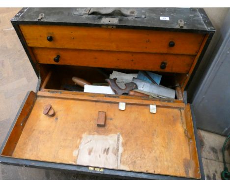 A Victorian fitted carpentry tool chest with interior drawers and a large assortment of carpentry and other tools 