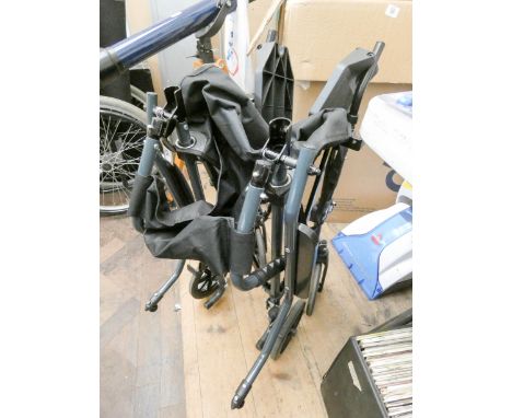 A light weight fold up wheel chair with folds very small 