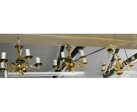 A pair of five branch brass electric light pendants and another similar  