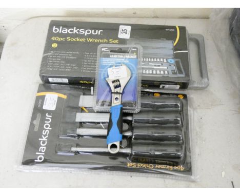 A new 40 piece socket wrench set, an adjustable wrench and a four piece chisel set 