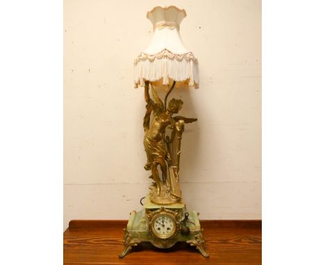 A French striking mantel clock in green onyx and gilt mounted case with large gilt angel figure with harp electric table lamp