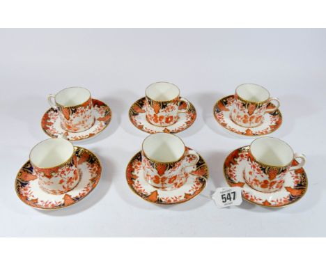 A set of six Royal Crown Derby cabinet coffee cups and saucers 