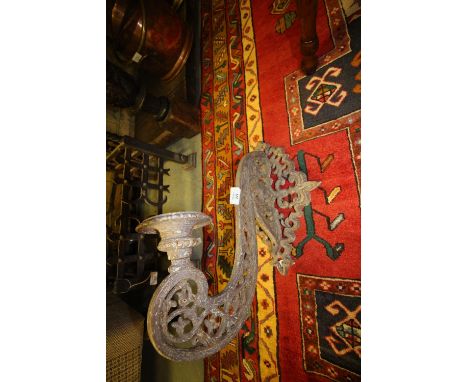Cast metal wall mounted pricket candlestick