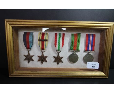Framed campaign stars, clasps &amp; medals - R Spatchett