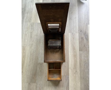 Vintage wooden till with applied brass top.