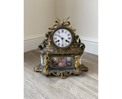 19th C french mantel clock, dial marked Hry Marc Paris,eight day movement, ornate case with three Sevres style panels, Vincen